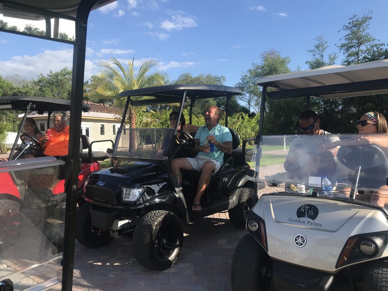 A man sitting in the back of an atv.